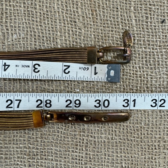 Vintage 1980’s women’s designer Motion East metal stretch belts S-M 30-34 inch - Picture 2 of 12